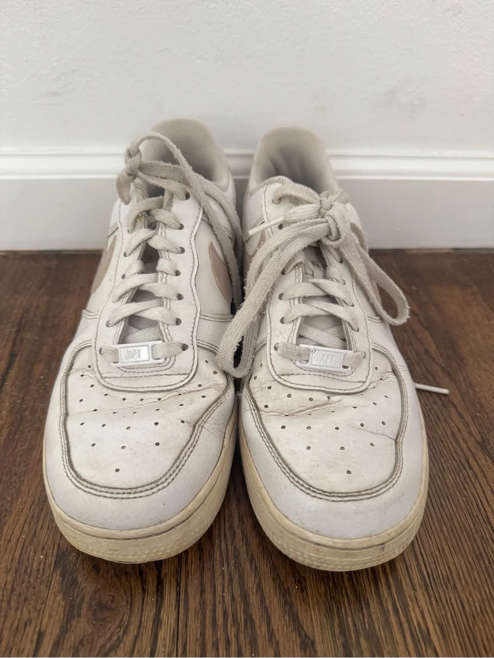 Nike air white sneakers with pink swoosh